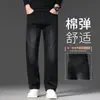 Jeans de hombre de alta gama en azul grisáceo para otoño, corte recto holgado, nuevo modelo 2026, pantalones casuales elásticos para mediana edad