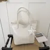 Bolso tote tejido de estilo europeo y americano de gran capacidad con colgante de encaje de estrella, bolso de hombro versátil para estudiantes, bolso de mano, bolso de axila