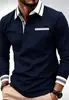 Nova camisa polo color-block masculina, com design de bolso falso, tecido macio e adequada para uso ao ar livre, casual e de negócios.