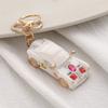 Adornos transfronterizos de moda, llavero creativo de resina para bolso de coche, accesorios de metal, colgante, pequeño regalo, joyería al por mayor