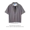 Camisa de manga corta a rayas, corte holgado, casual, marca de moda, nueva moda para hombre, camisa elegante y moderna, camisa de imitación de dos piezas