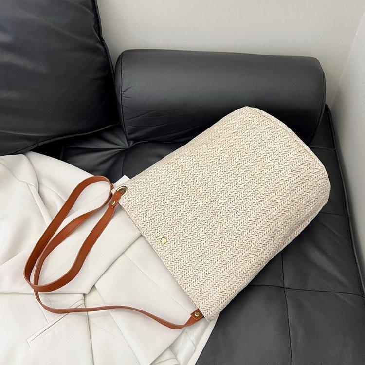 编织包女包新款潮2024夏草编简约百搭小清新水桶包个性单肩斜