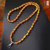 Cadena de Amuleto Budista Tailandés Flor de Cera de Abeja Imitación Ámbar Acero de Titanio Hebilla Giratoria de Pico de Águila Hebilla Universal de Liberación Rápida Color Dopamina