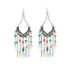 Aretes de Estilo Exótico de Venta Caliente Retro Literario Clásico Dignificado Ganchos para la Oreja Versátil Hueco Moda Borla Colgantes