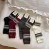 Nuevos calcetines apilados de longitud media de tendencia étnica de doble estilo vintage para otoño e invierno al por mayor, calcetines originales únicos para mujer