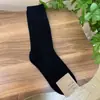 Calcetines Etna para Mujer Importados de Dongdaemun, Corea del SurDe Media Caña Lisos Acanalados Otoño e Invierno Nuevos Calcetines de Algodón en Gris al por Mayor
