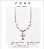 Collar cruz de tres capas para mujer, cadena para suéter de diseño avanzado de nicho de lujo ligero, joyería de estilo frío y temperamental al por mayor