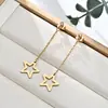 Moda Transfronteriza Acero Inoxidable Pendientes de Borla de Amor de Alta Gama para Mujer Estilo Europeo y Americano Pendientes de Diamante de Lujo Ligero Pendientes