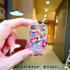 Llavero de oso de té de burbujas de moda, colgante de llave de botella de arena movediza, adornos de escritorio, joyería, colgante para bolso al por mayor