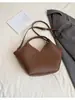 Bolso de Cubo de Mano Casual de Nicho para Mujer 2025 Invierno Nuevo Bolso de Hombro Cruzado de Alta Calidad para Viajes