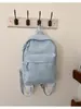 Mochila de estrella transfronteriza, gran capacidad, linda, ligera, mochila estilo Ins para estudiantes de secundaria, mochila simple y moderna para estudiantes universitarios
