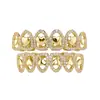 Accesorios Dentales de Moda con Forma de Corazón Hueco Dorado tipo Espejo Transfronterizo para Mujeres, Adornos Dentales Versátiles para el Carnaval de Navidad de Amazon