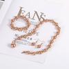 Joyería transfronteriza de moda para comercio exterior, anillo clásico de diamantes, aretes de perlas de plástico, pulsera, collar corto para la clavícula, juego de tres piezas