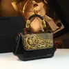 Bolso Pequeño Estilo Chino para Mamá 2026 Nuevo Vintage Cuero Tallado Bolso de Mano Elegante Cuero Genuino Nueva Gran Capacidad Estilo Étnico