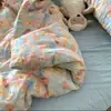 Juego de tres piezas de hilo de algodón de doble capa estilo Ins Una funda de almohada floral de gasa de algodón puro respetuosa con la piel un par de sábanas de color sólido