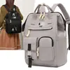 Mochila minimalista estilo japonês, cor sólida, com múltiplos bolsos, para mães, com armazenamento em camadas para carregar seus bebês, adequada para passeios e saídas, mochila versátil