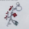 Regalos y regalos Fabricantes de hebillas colgantes Colgante de bolsa de aceite de gota personalizado Llavero de metal creativo