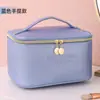 Nova bolsa de maquiagem em couro PU com padrão cruzado, bolsa de higiene pessoal à prova d'água, nécessaire multifuncional portátil para armazenamento de skincare