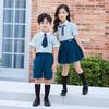 Conjunto de uniforme escolar para estudiantes de primaria, uniforme de clase estilo británico de manga corta de verano, uniforme de jardín de infantes, ropa de verano, fotos de graduación, productos nuevos.