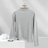 Camiseta de manga larga básica ajustada para mujer que realza la figura, de canalé, color liso, cuello alto, top fino versátil para primavera y otoño