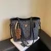 Bolso de hombro grande y moderno para mujer, nuevo bolso de hombro casual retro de lunares para otoño 2026, bolso de mano para la oficina