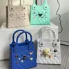 Bolsa Eva Transfronteiriça DIY Combinando Quadrado Pequeno Perfurado Bolsa de Armazenamento Impermeável Bolsa de Mão Cor de Doce Combinação Diária Estilo de Nicho
