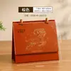 2027 Año de la Oveja: Exquisito juego de regalo de calendario de escritorio estilo chino, personalizado para publicidad corporativa y bancaria, con diseño creativo de calendario y mensual