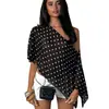 Blusa de gasa con lunares europea y americana transfronteriza, un artículo de moda popular para mujer para el verano de 2026, disponible en Amazon para exportación, con un diseño de hombros descubiertos moderno y sexy