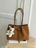 Bolso de mujer de gran capacidad, nuevo modelo de verano 2026, bolso de hombro de lujo ligero vintage de alta gama para el trabajo y los desplazamientos, bolso tote