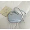 Bolso de mano Ganbo Boston 2026 primavera/verano nuevo, bolso cruzado casual versátil, bolso tipo bowling dorado
