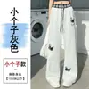 Toma real de los pantalones casuales de pierna ancha con estampado de dibujos animados de nuevo estilo primavera-verano 2026 para mujer, pantalones deportivos de chándal adelgazantes y versátiles