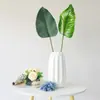 Venta caliente de Amazon hojas tropicales artificiales flores plantas verdes con césped floral decoración del hogar manualidades de plantas verdes