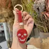Moderna y Creativa Calavera Personalizada de Halloween Incrustada de Diamantes Llavero de Coche Exquisito Colgante para Bolso Estilo de Moda
