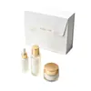 Cajas de regalo tipo libro con tapa abatible de alta gama hechas a medida, sets de productos cosméticos y para el cuidado de la piel, y cajas de regalo con relieve y estampado de lámina dorada.