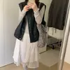 Toma real del nuevo chaleco de cuero sin mangas de capas vintage de alta gama para mujer coreano de Dongdaemun otoño 2026