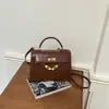Bolso pequeño retro transfronterizo, nuevo estilo moderno, moderno y versátil, bolso tipo Kelly, bolso de hombro popular, bolso cruzado