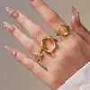 Rueda de la Fortuna Europea y Americana Acero Inoxidable Redondo Hueco Diseño Geométrico Juego de Anillos Nicho Transfronterizo Joyería de Anillos para Mujeres