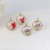 Aretes exquisitos de flor real de venta caliente transfronteriza resina gota pegamento joyería de flor seca aretes nomeolvides joyería artesanal al por mayor