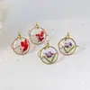 Aretes exquisitos de flor real de venta caliente transfronteriza resina gota pegamento joyería de flor seca aretes nomeolvides joyería artesanal al por mayor