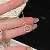 Anillo de botella de perfume color oro rosa, collar brillante de circonita, cadena para clavícula de lujo de alta gama, nicho exquisito para mujer