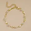 Pulsera de circón de amor dulce y fresca para niñas, diseño simple de nicho ins, joyería de mano hueca con forma de corazón para estudiantes, regalo versátil