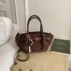 Bolso cesta pequeño casual muy elegante y de moda para mujer, nuevo bolso de hombro versátil de estampado de leopardo vintage, bolso tipo cubo para ir al trabajo