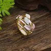 Anel Elástico Geométrico Vazado de Pétala Colorido Esmaltado Novo Transfronteiriço para Mulheres Simples de Alto Padrão Flor Versátil