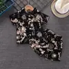 2024 Novo Conjunto de 2 Peças Camisa de Manga Curta com Estampa Completa e Shorts Infantis Moda de Verão Masculina e Feminina Uma Peça de Cabelo