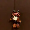 Encantador perrito peludo con la lengua fuera, llavero para bolso, colgante de dibujos animados natural, semillas de terapia de sonido curativas, popular en zonas escénicas, amuleto divertido y adorable
