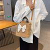 Bolso de paja de diseño nicho de textura popular de este año 2023 nuevo bolso de mujer bolso bandolera de moda de verano bolso tipo cubo