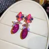 Pendientes de plata estilo europeo y americano con diseño ovalado de cristal incrustado de diamantes, pendientes vintage de lujo ligero de alta gama, accesorios de moda y versátiles
