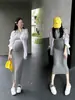 Saia reta plus size para grávidas, modelagem solta, cintura alta, versátil para o enxoval de maternidade.