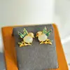 Pendientes Ovalados de Huevo de Jade Blanco Hetian de Xinjiang Plata s925 Chapado en Oro Personalidad Gloria Pendientes de Urraca