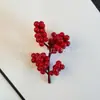 Venta al por mayor de fabricante transfronterizo de bayas rojas artificiales, fruto de acebo de la fortuna, decoraciones festivas de Navidad y Año Nuevo para el hogar